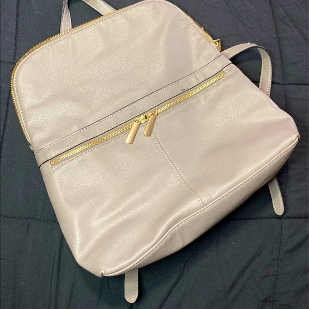 A new day backpack purse